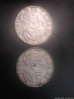 Reverse sides showing dates 1923 and 1928 with CANADA FIVE CENTS and maple leaves