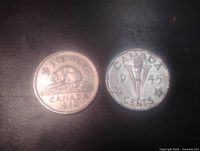 1942 beaver reverse and 1945 Victory reverse shown side by side