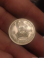 Reverse of 1949 one shilling coin showing crowned lion