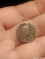 Obverse showing bust portrait and hole near rim