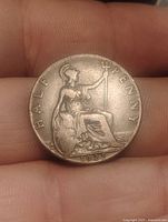 Reverse of 1925 half penny showing seated Britannia with denomination and date