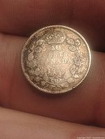 Reverse of 1936 Canadian 10 cent coin showing denomination, country, date, wreath and crown