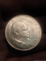 Reverse side showing Winston Churchill portrait and lettering