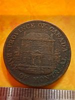 Obverse side showing building and legends