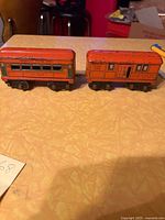 Both American Flyer tin cars coupled together on table