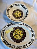 Platter and bowl together showing pattern and scale