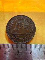 Reverse side showing oak tree design and denomination