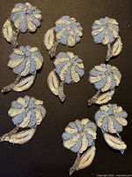 Group of ten matching beaded sequin flower appliqués