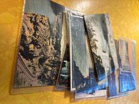 Stack of vintage Niagara Falls postcards in sleeves