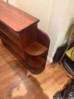 Front and side view showing shelves and corner display shelves