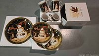 Full set showing plates, mugs, platter and box