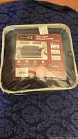 Sealed Sure Fit loveseat cover package front view