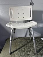 Front view of Guardian 30402 bath chair showing seat, backrest and legs
