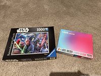 Both puzzle boxes side by side showing fronts