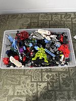 Top view of bin showing assorted Bionicle & Hero Factory parts
