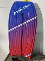 Front deck view showing graphics, contours and leash