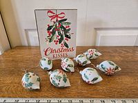 Overall lot: plaque and eight ornaments