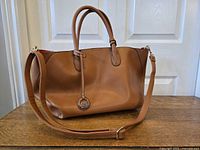 Full view of Dudlin tan shoulder bag with handles and strap