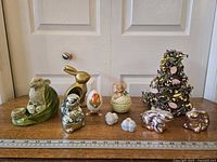 All items lined up on table with ruler for scale