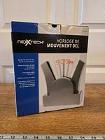 Front and left side of sealed NexxTech LED Motion Clock retail box