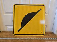 Front view of square reflective speed hump sign