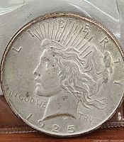 Obverse side showing Liberty profile with inscriptions and date 1925.