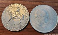 Both 1977 Silver Jubilee coin and 1965 Winston Churchill coin showing obverse sides.