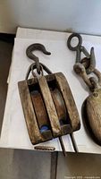 double-sheave wooden pulley with hook, side view