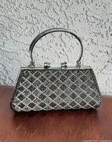 Front view showing beaded lattice panel and overall shape