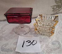 All items together showing red box on pedestal and three clear ashtrays