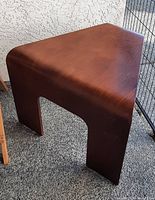 Front angled view showing triangular top and bentwood legs