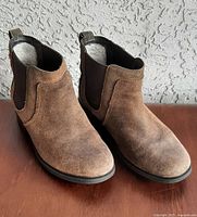 Front view of brown suede UGG Bonham boots pair
