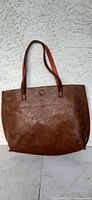 Front view brown side of GH Bass reversible tote