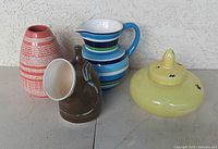 Group shot of all four pottery items