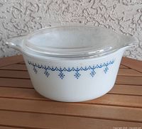 Side view showing blue Snowflake pattern and clear lid