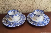 Two complete 4-piece place settings displayed