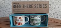 Mugs in original box showing labels China and Guangzhou