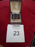 Earrings in original The Bay velvet box, lot card visible