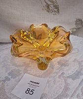 Top view showing petal-shaped amber glass bowl