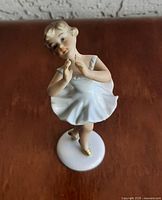 Front view of Wallendorf ballerina figurine on circular base