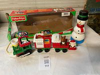 Full lot showing locomotive, train car with reindeer, snowman, and original box