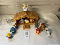 Full set laid out showing stable, figures, animals, accessories