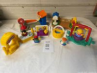 Overview of all figures and playset parts on table