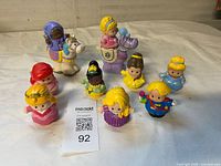 Group shot of all Little People figures and horses