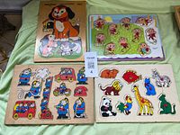 All four wooden puzzles arranged on surface