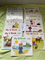 All thirteen My First Steps to Reading books arranged in two columns showing front covers and titles