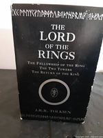 Slipcase front showing title and trilogy list