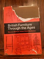 Front view of the book showing torn dust jacket and title