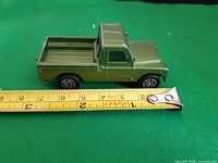 Left side view with ruler showing length