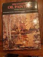 Front cover of Discovering Oil Painting hardcover book